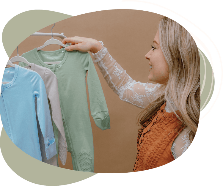 Maddie browsing Scoot Suits of different colors